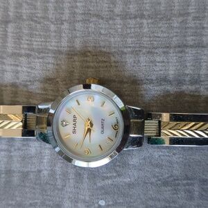Vintage Sharp quartz watch for women with a two-tone (gold and silver)